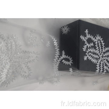 Tissu en maille 100% nylon blanc avec paillettes